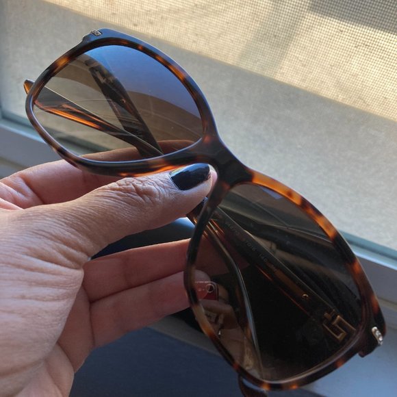 Tortoise shell Versace sunglasses and case